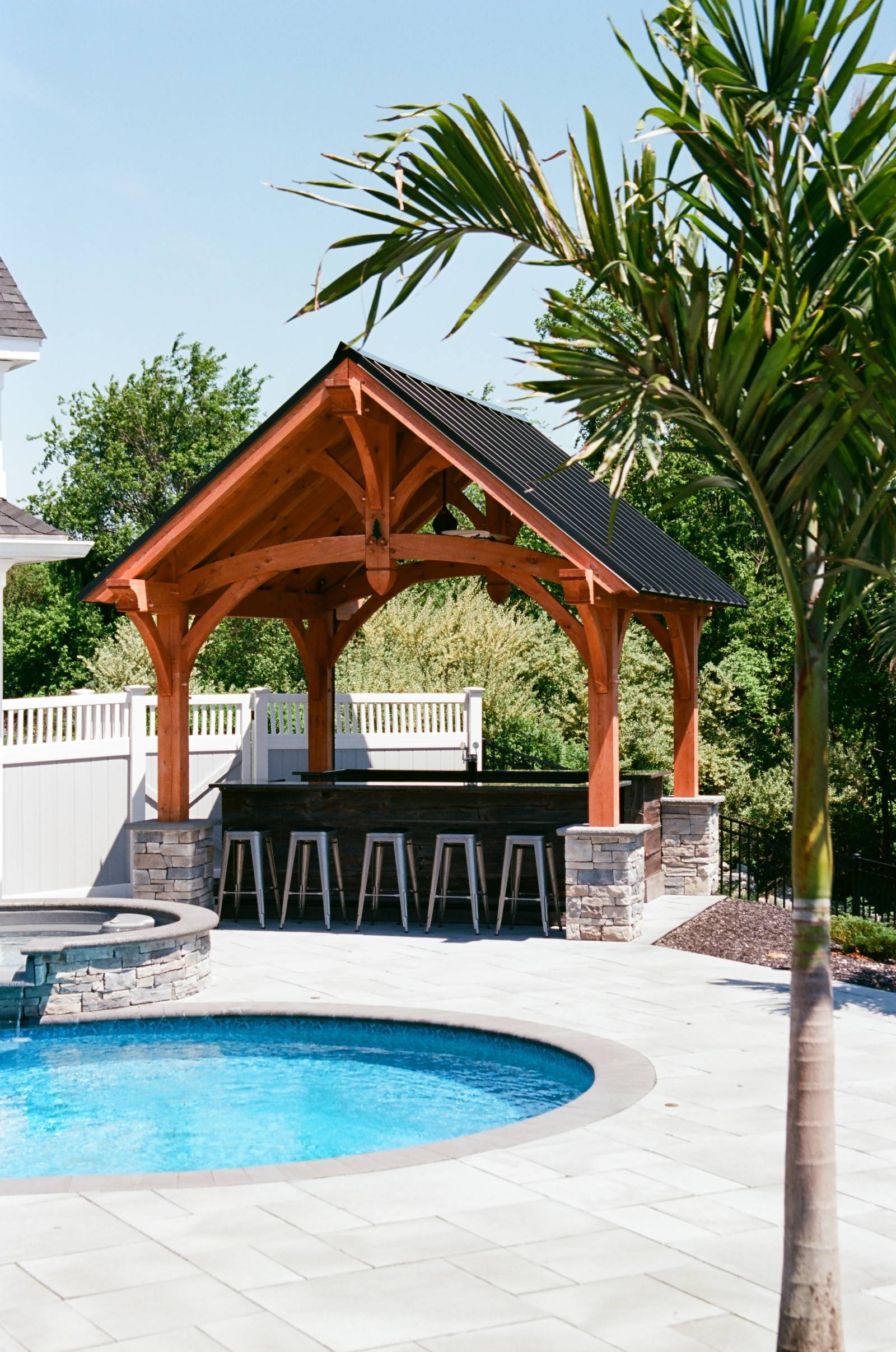 Teton Timber Frame Pavilion • Palm Trees • Pool