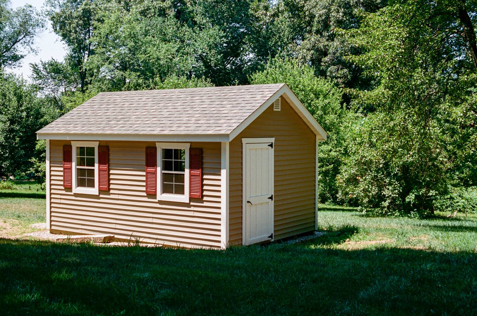 3' Single Door • Vinyl Siding (Clay color) • 30 Year Architectural Shingles (Weathered Wood)