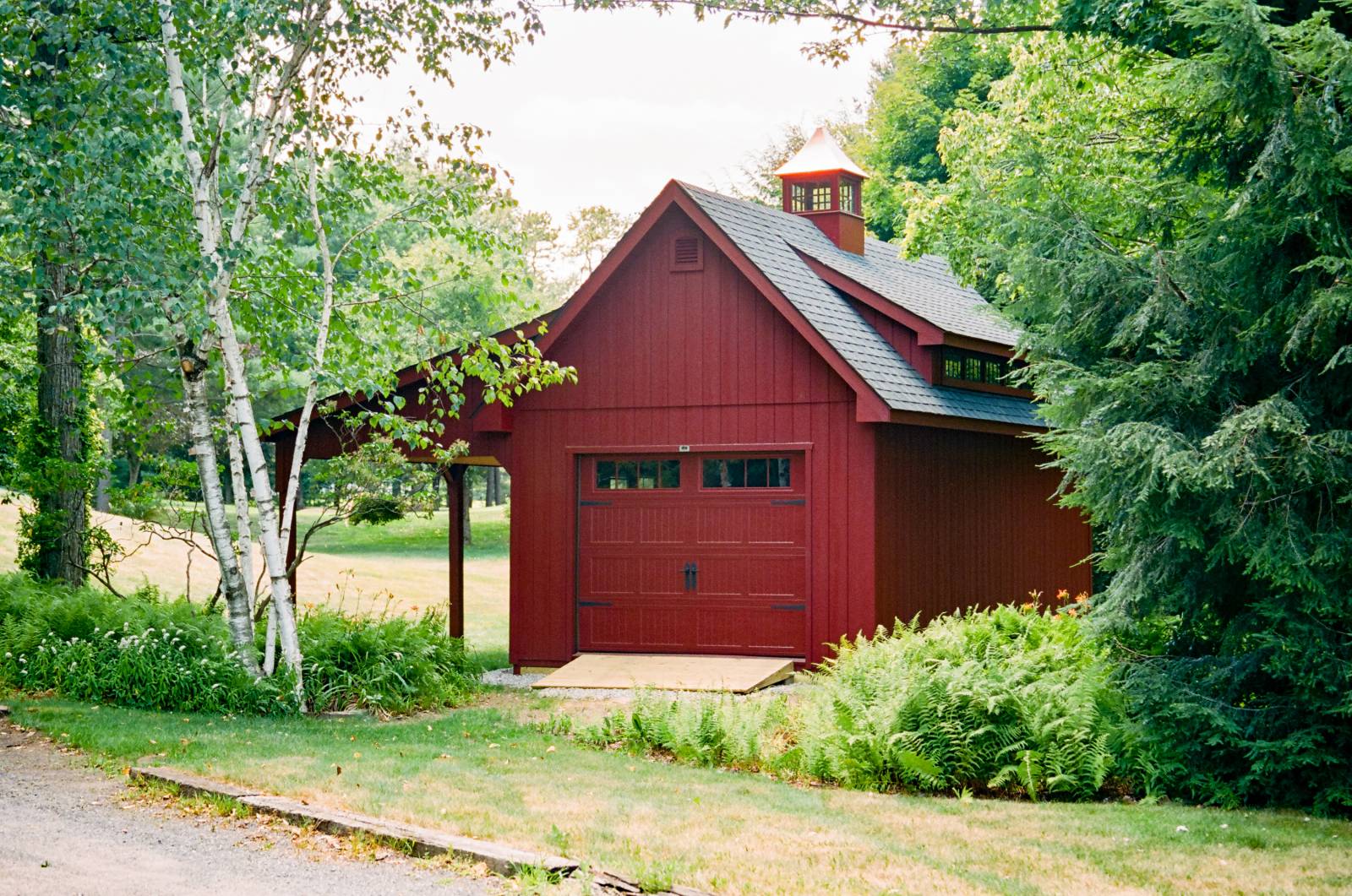 Featuring a 5-Window Transom Dormer and Garage Door