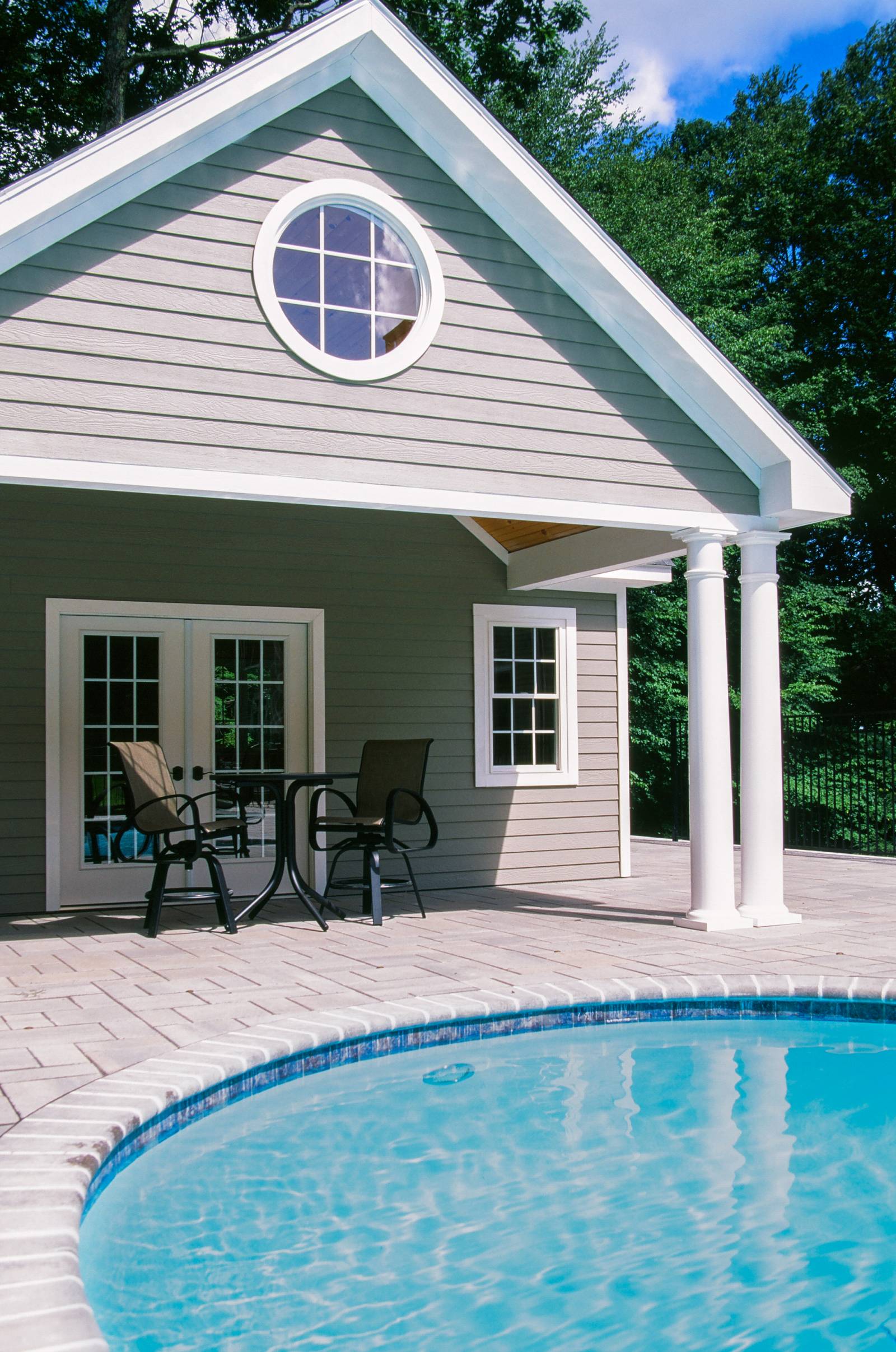 18' x 10' overhang with 4 round columns & 3' round window