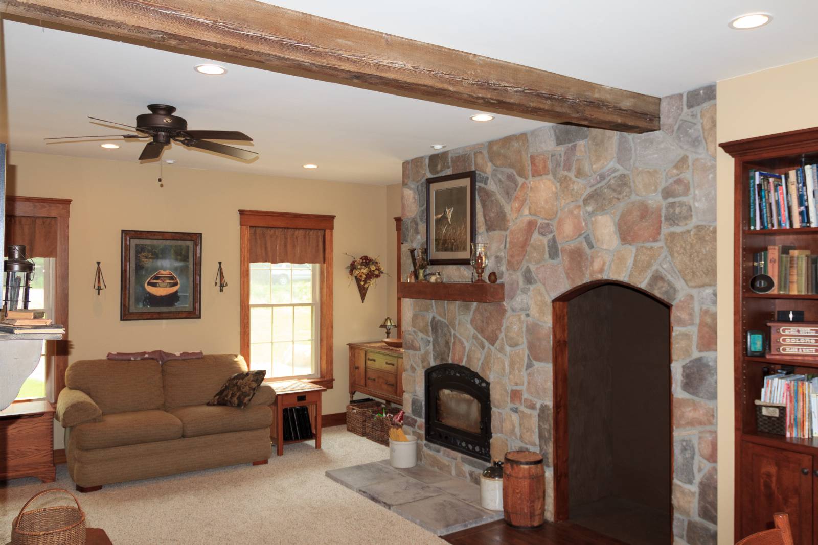 Living room with rustic exposed beam