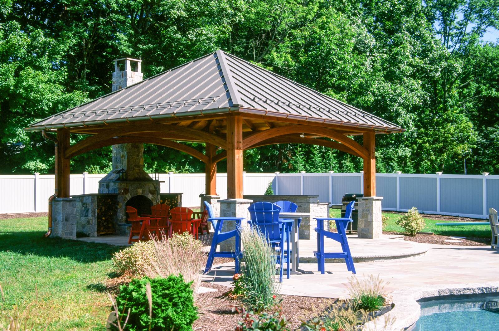 Standing seam metal roof • authentic timber frame construction