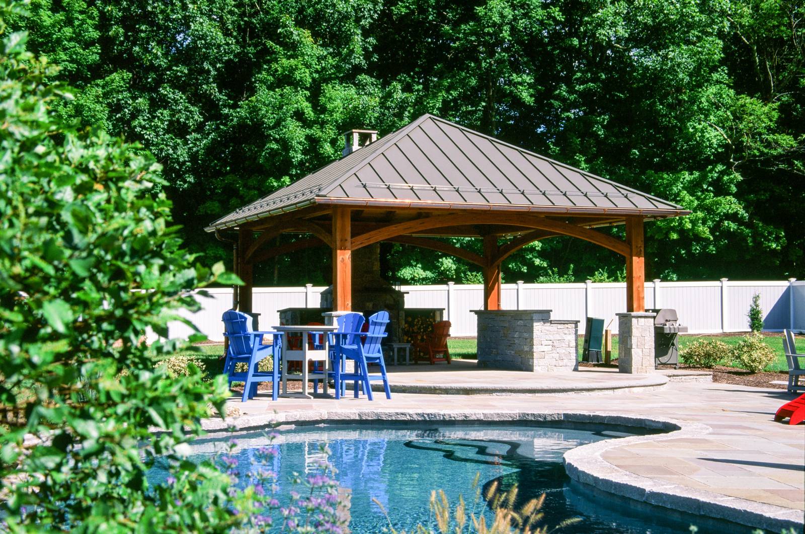 Arched beams • hip roof • copper gutters