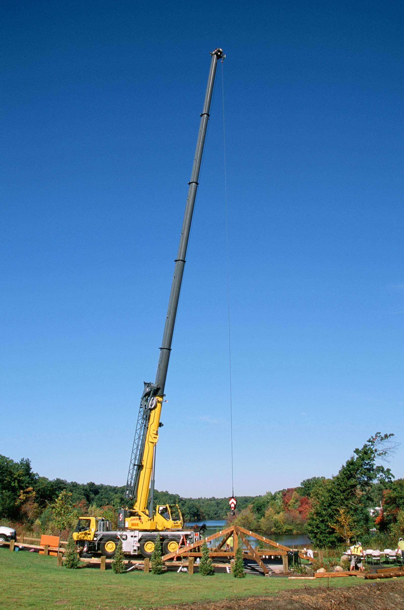 Crane in place to raise the roof assembly