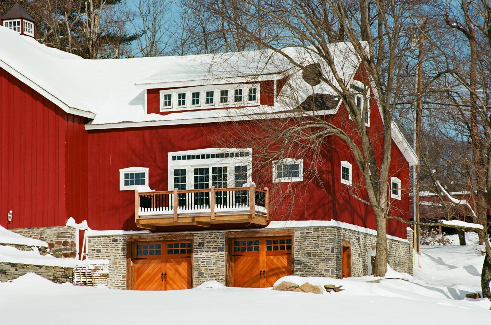 Closeup showing the 3-story post and beam barn