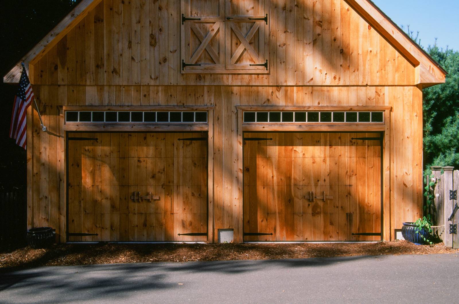 Pine faced overhead doors with transom windows above