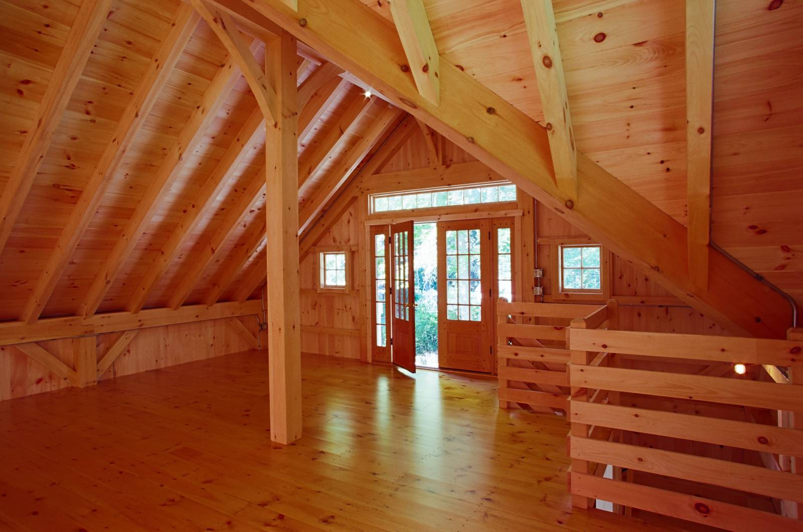 Standing inside the reverse gable dormer looking towards the second floor entrance and stairway