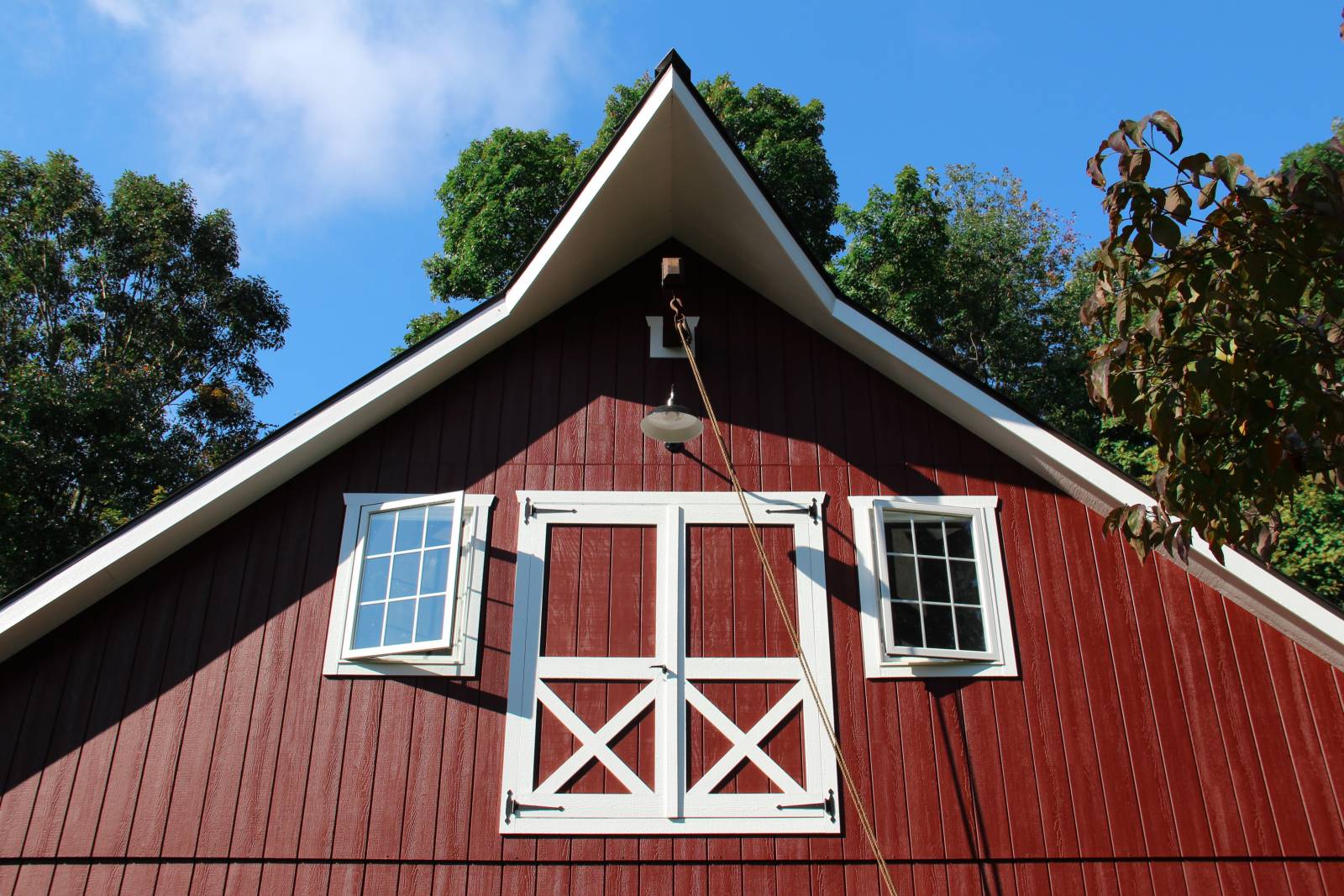 Cow Catcher Gable Peak • Faux Trolley Beam • Hinged Loft Doors • Insulated Casement Windows