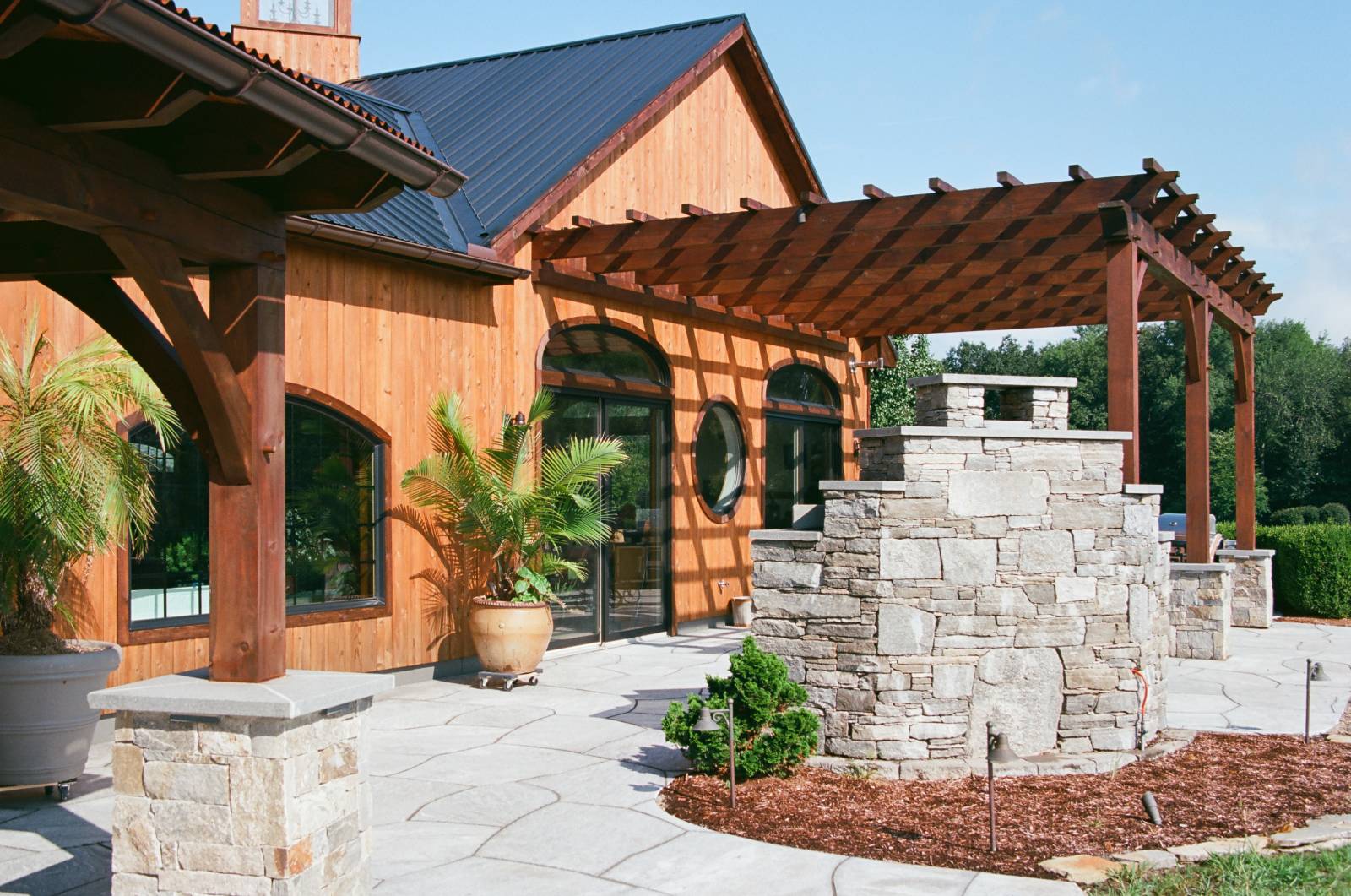 Timber Frame Pergola off the Garage Portion