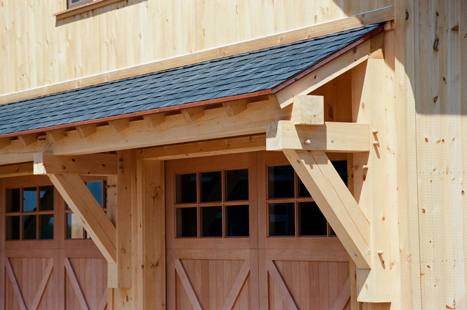 Closeup: Big Sky Timber Frame Eyebrow Roof