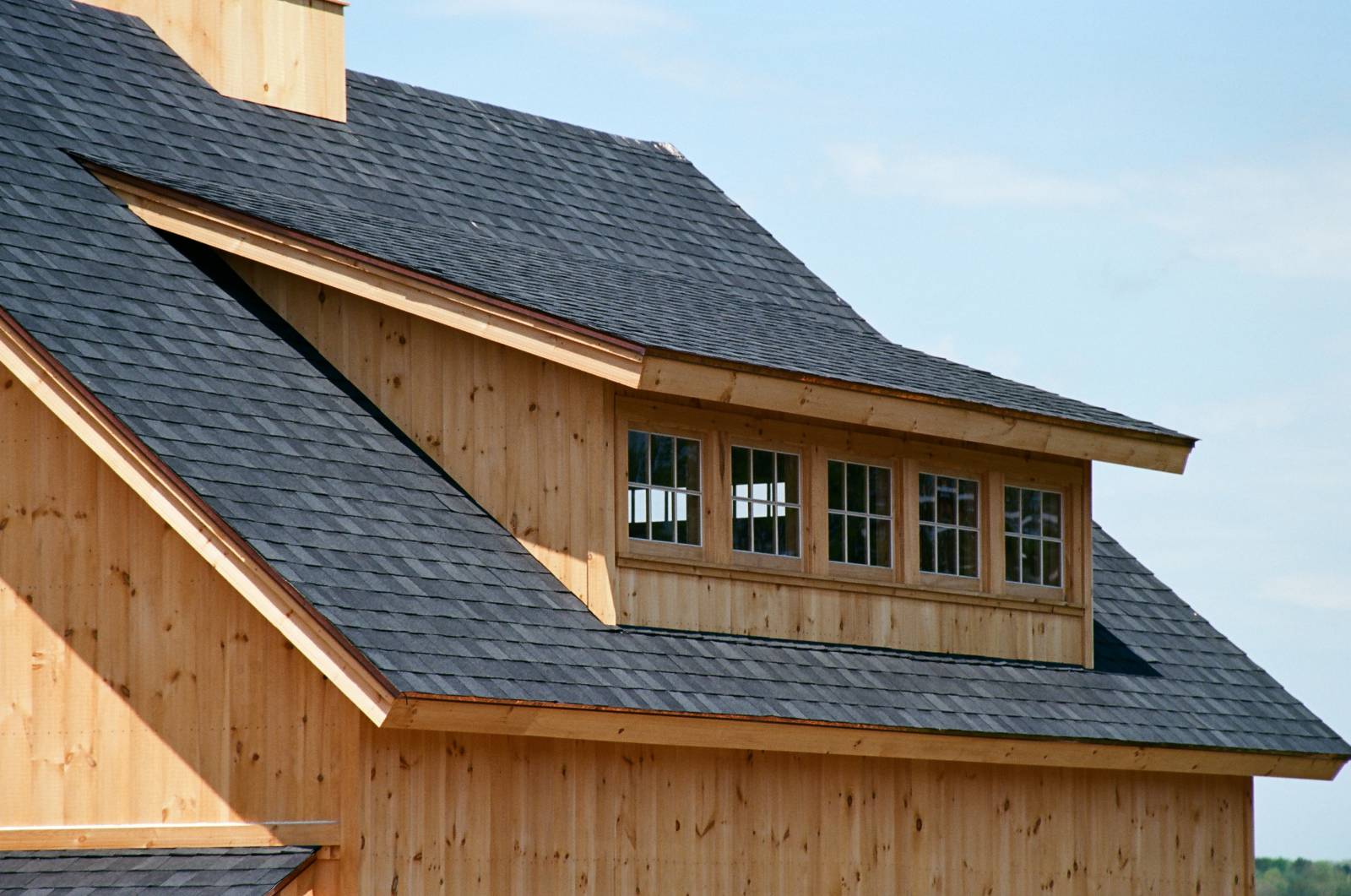 Exterior of the 16' transom dormer with pine sash windows