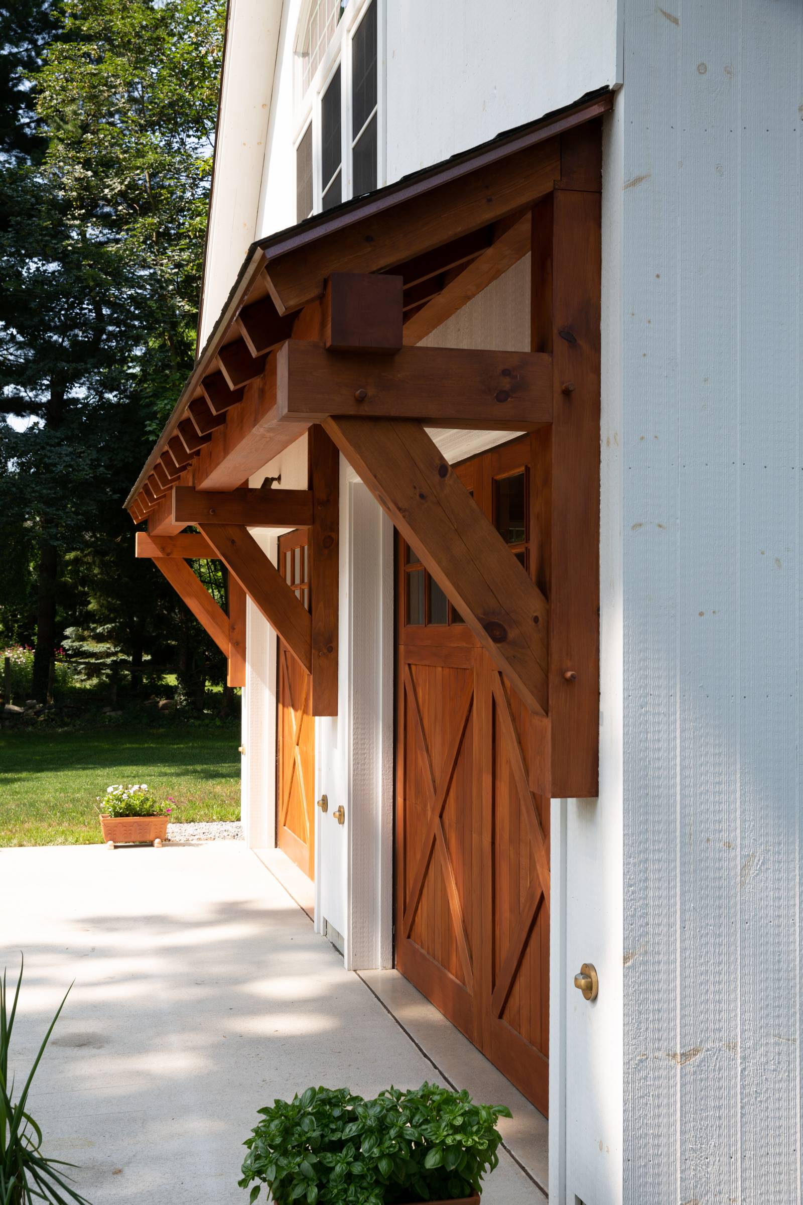 Authentic Timber Frame Joinery on the Big Sky Timber Frame Eyebrow Roof