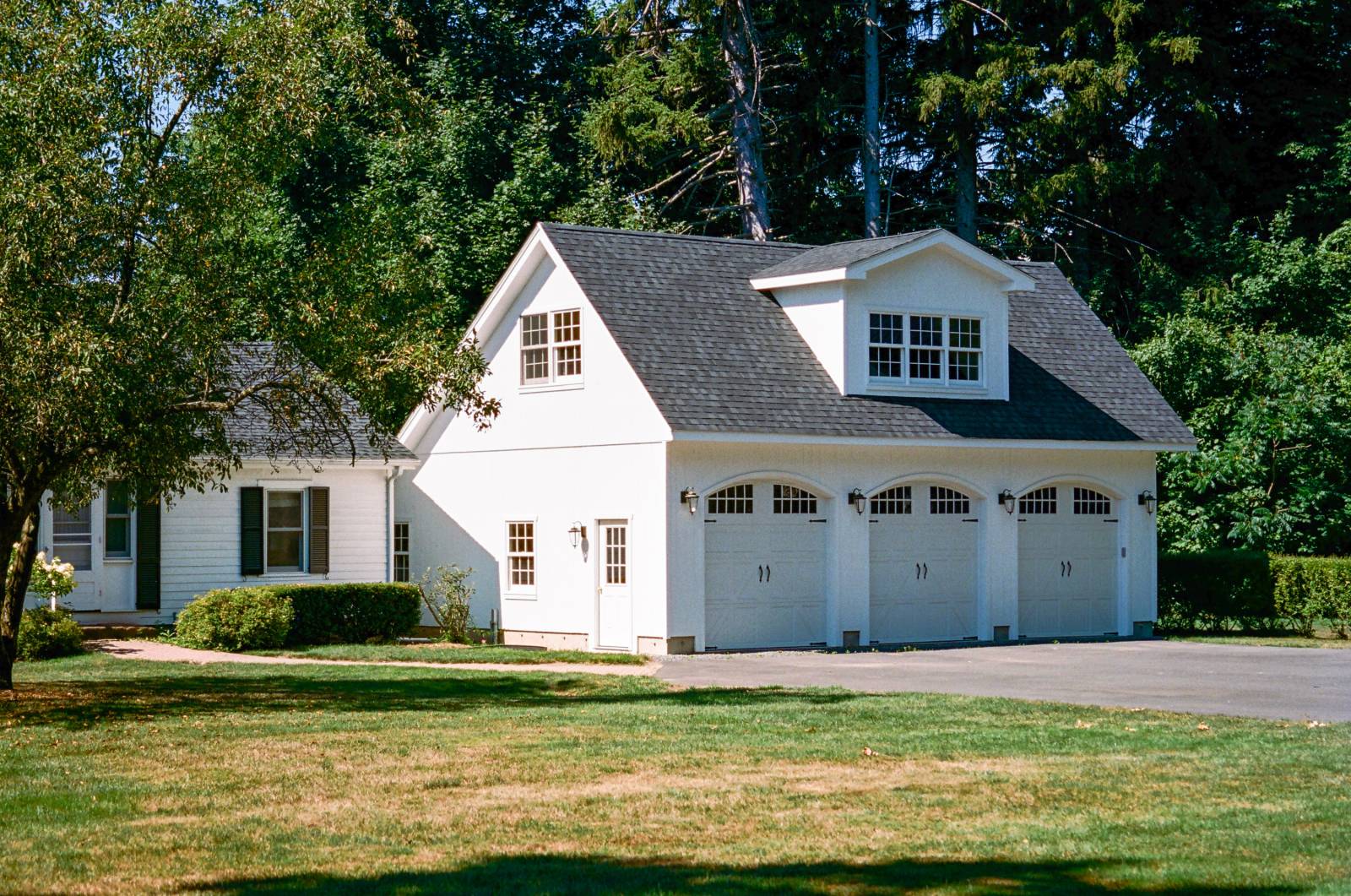 3 car 1 Â½ story garage with 3-window dormer