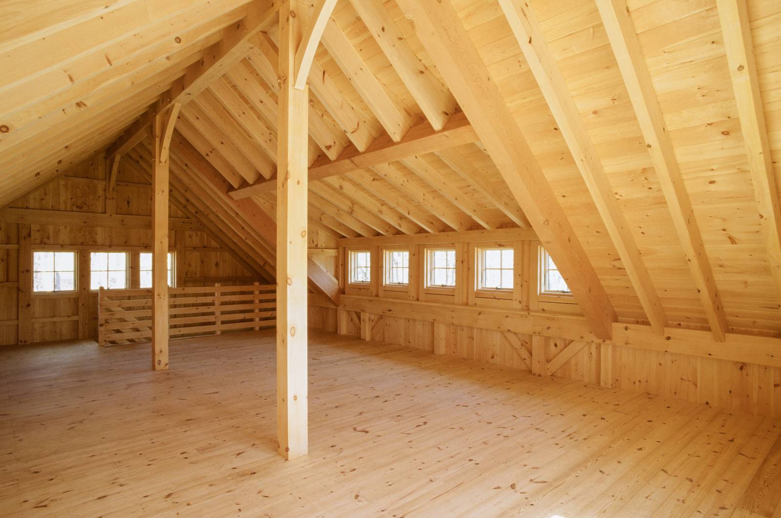 Upstairs Interior of Post & Beam Carriage Barn with SIP Panels for Insulation