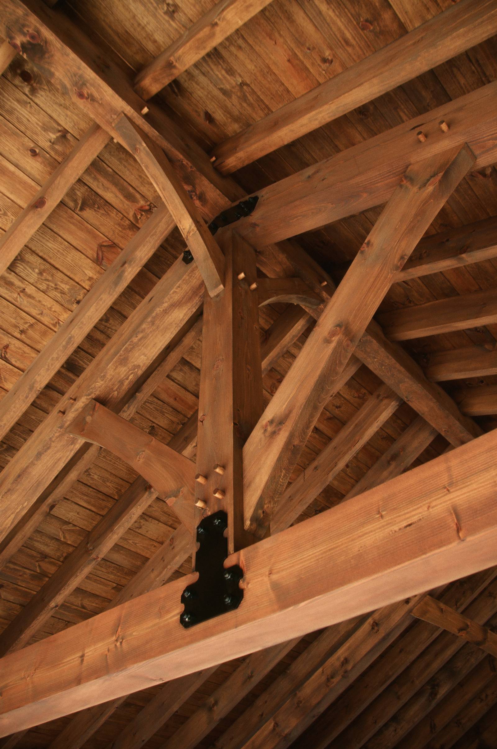 King Post with Traditional Wood Joinery and Powder-Coated Steel Gussets for Added Strength