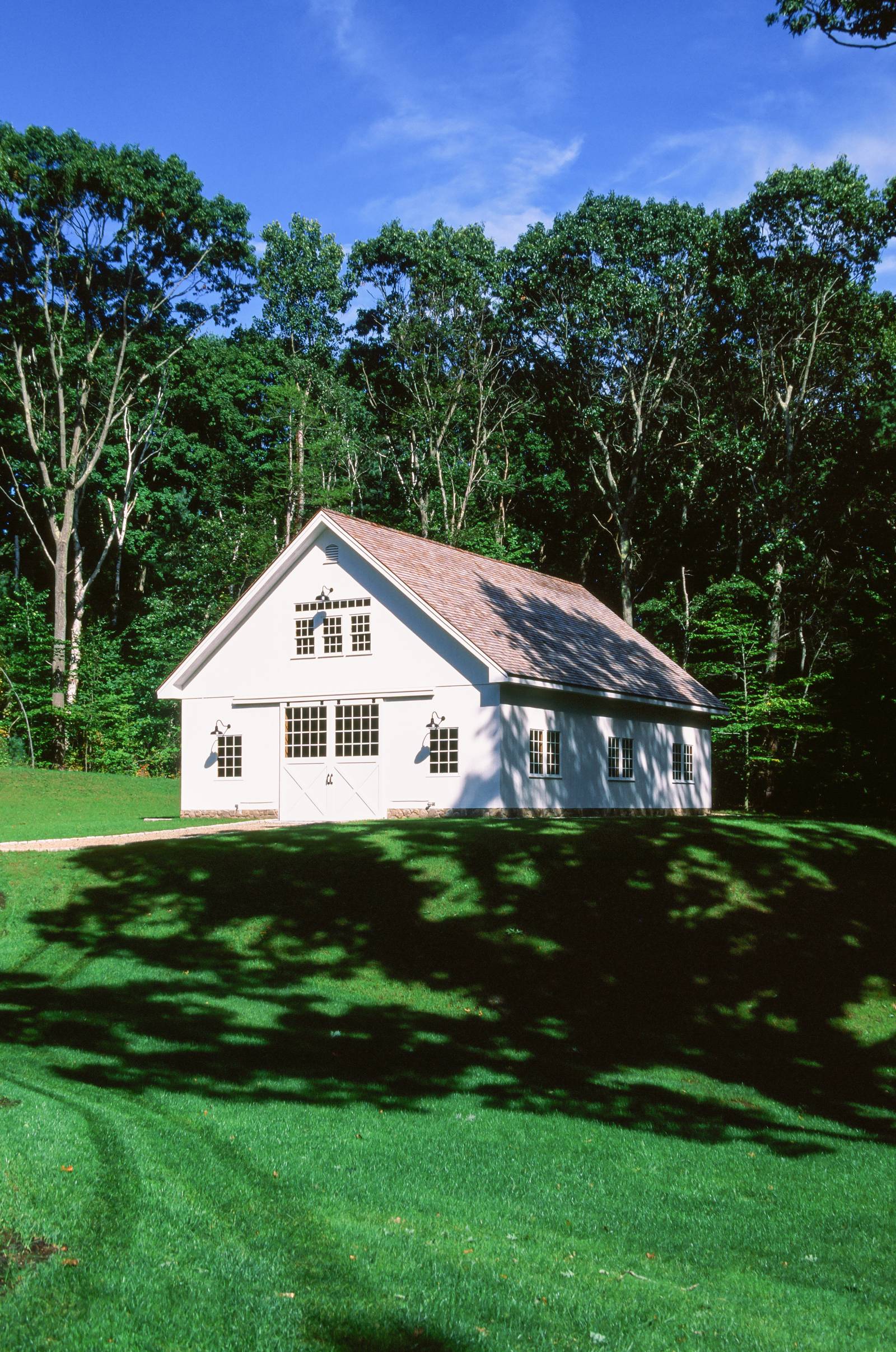 Iconic American Barn • Post & Beam Construction • White 1x8 Vertical Shiplap Pine Siding • Sliding Barn Doors • Cedar Shake Roof