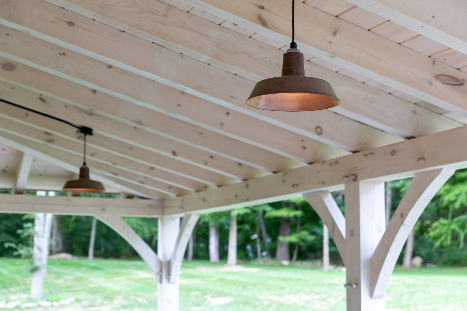 Stained Eastern White Pine Timbers in the Open Lean-To • Pendant Lights