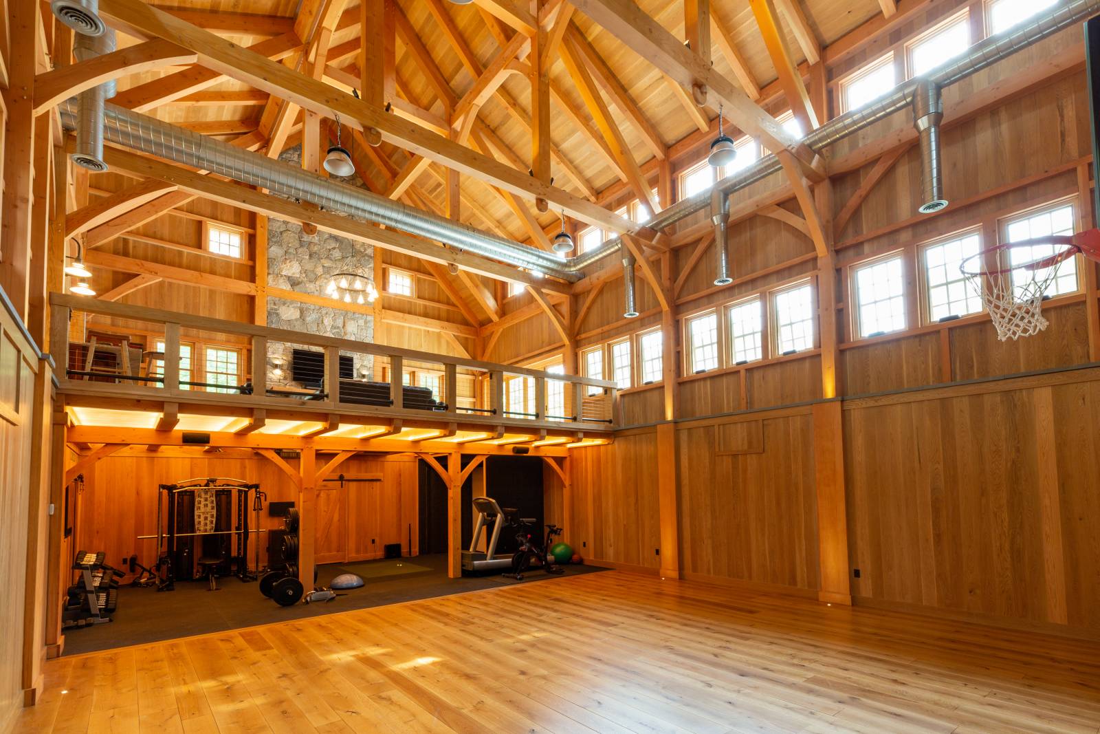 Stunning Interior of this 32' x 50' Custom Timber Frame Barn with Indoor Basketball Court
