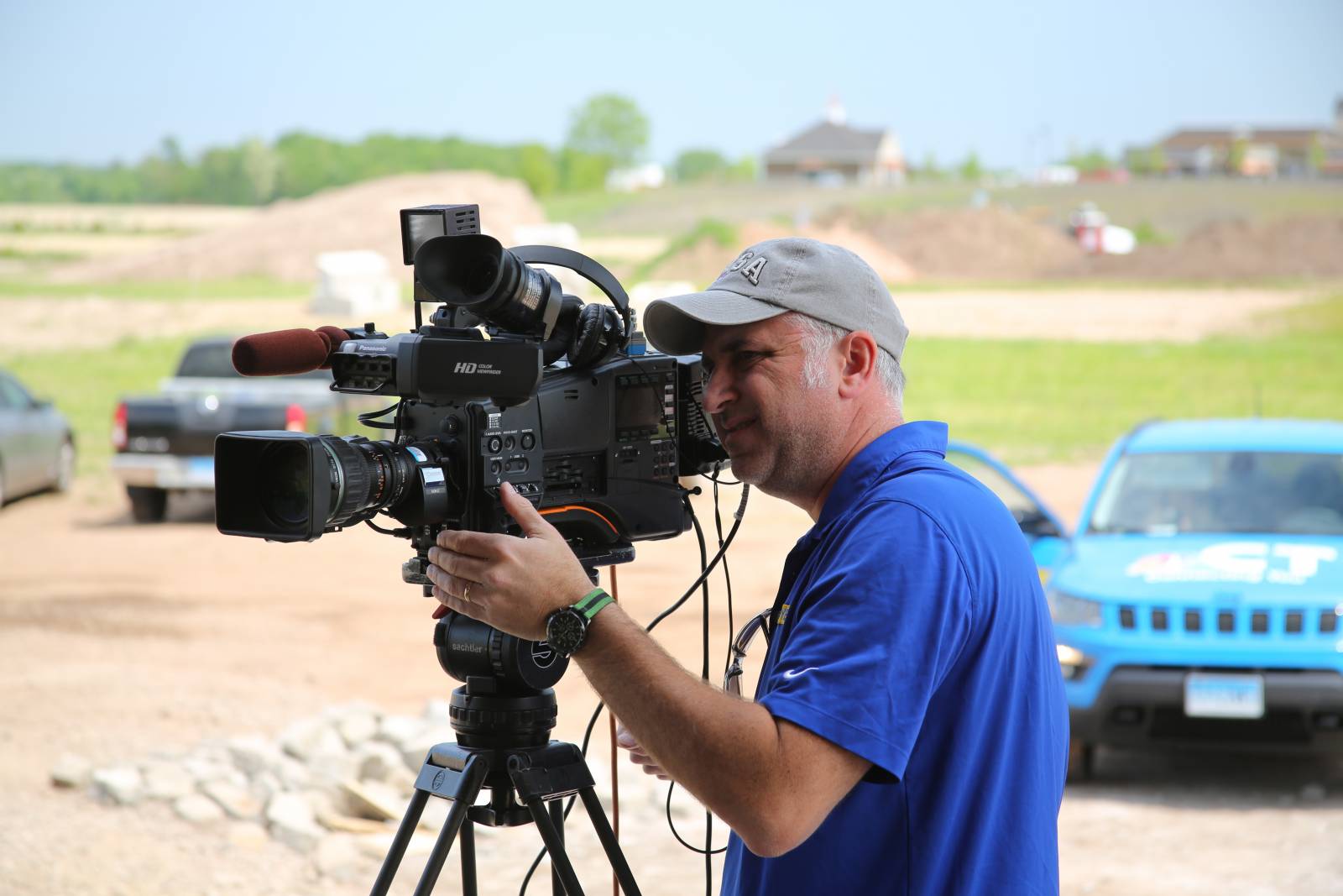 Cameraman John gets the camera ready for the broadcast