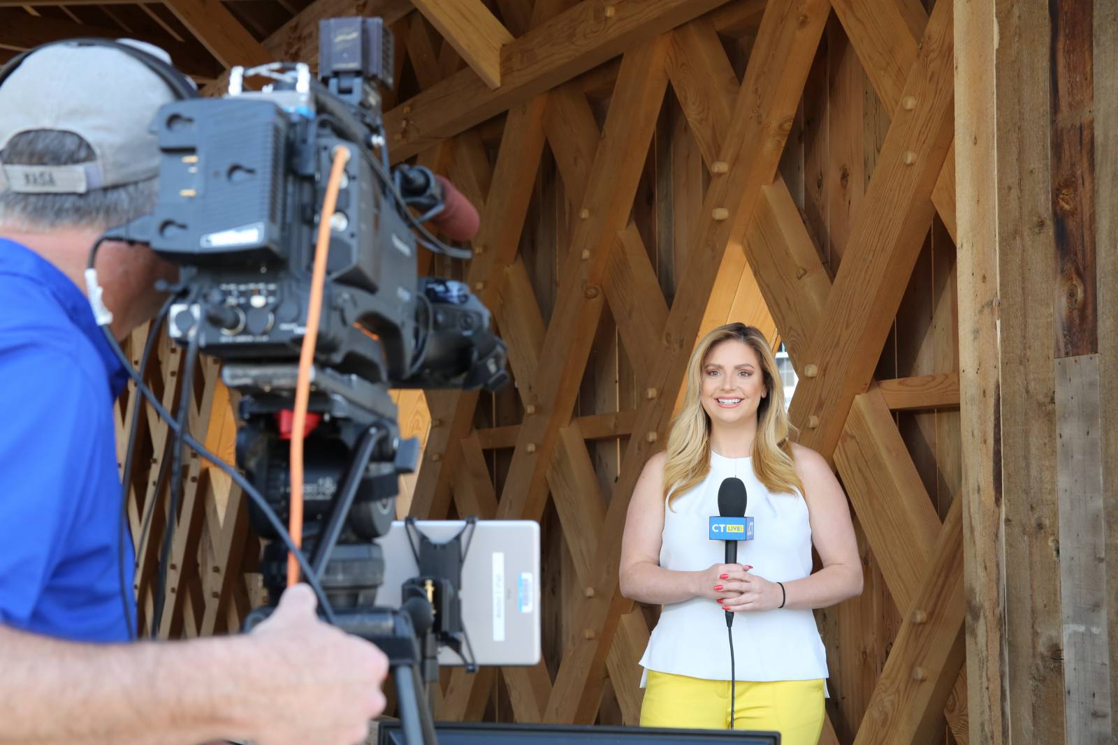 Action! CT LIVE! host Taylor Kinzler on camera