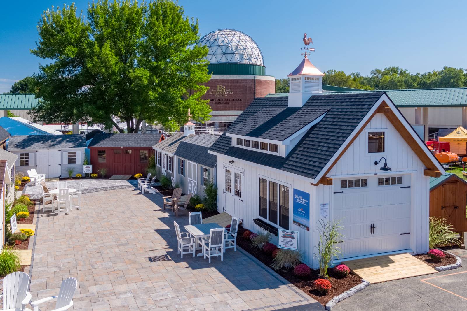 Aerial view of the 14' x 24' Grand Victorian Cape Garage and more on display