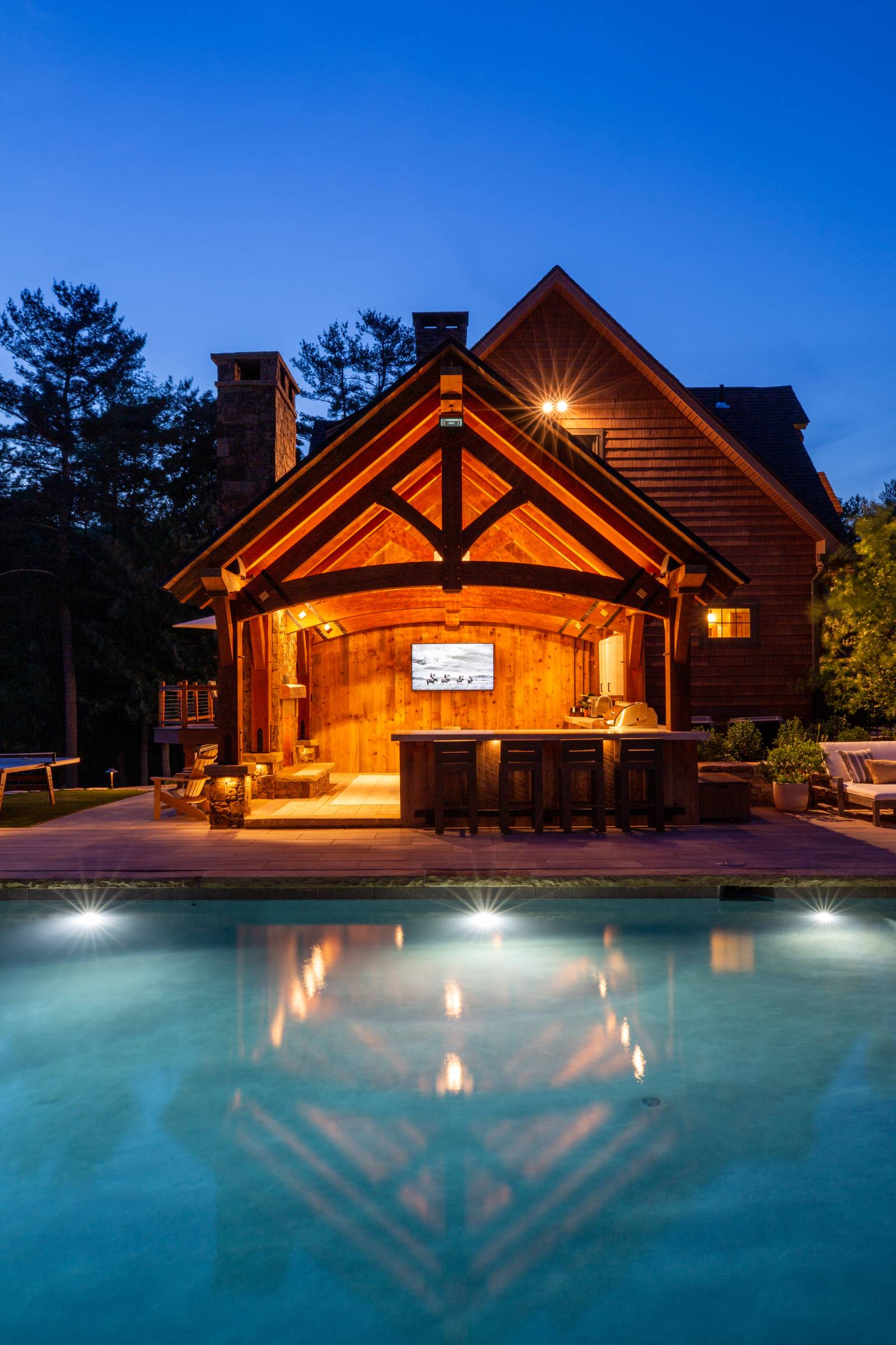 The Pavilion at Night • King Post Trusses with Arched Bottom Chords