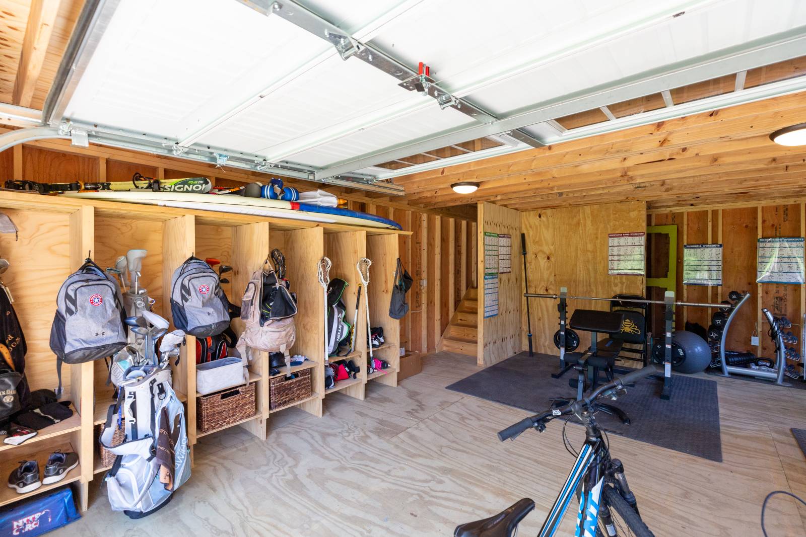 Shelves for Equipment and Gear • Super Floor • Stairs in the Back