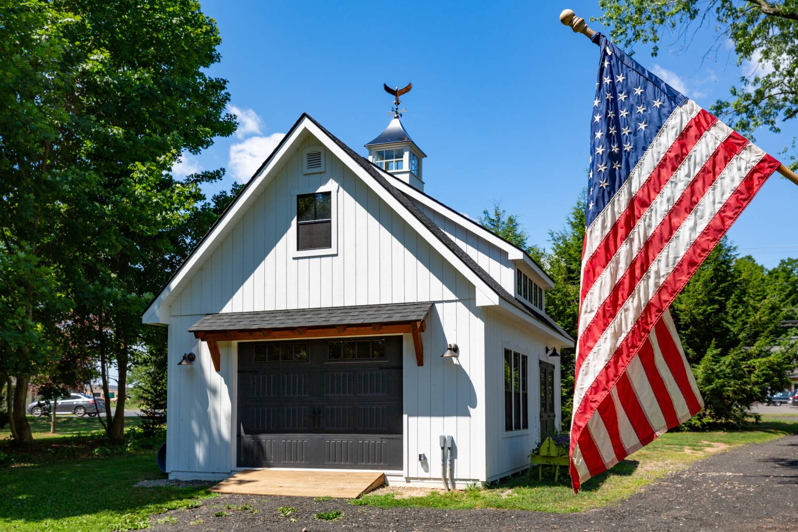 Timber Frame Eyebrow Roof • 10' x 7' Overhead Door • 24" x 40" Window in Gable