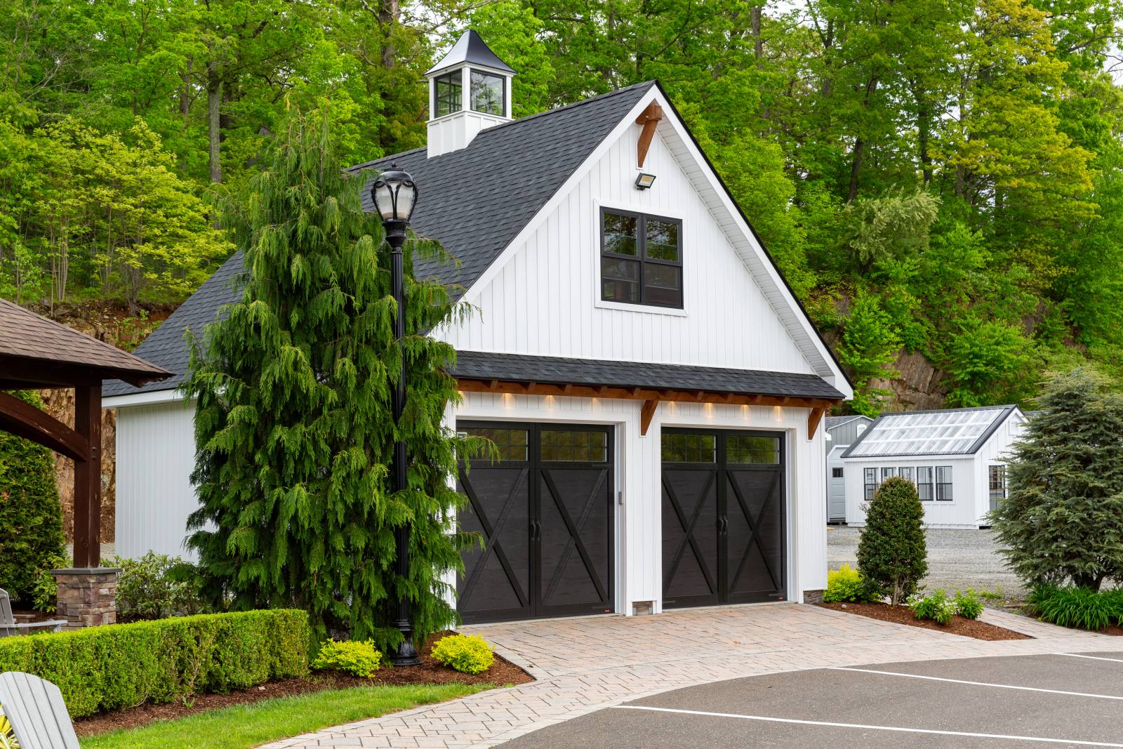 Modern Farmhouse Timber Frame Eyebrow Roof • Corbel Accent in Gable