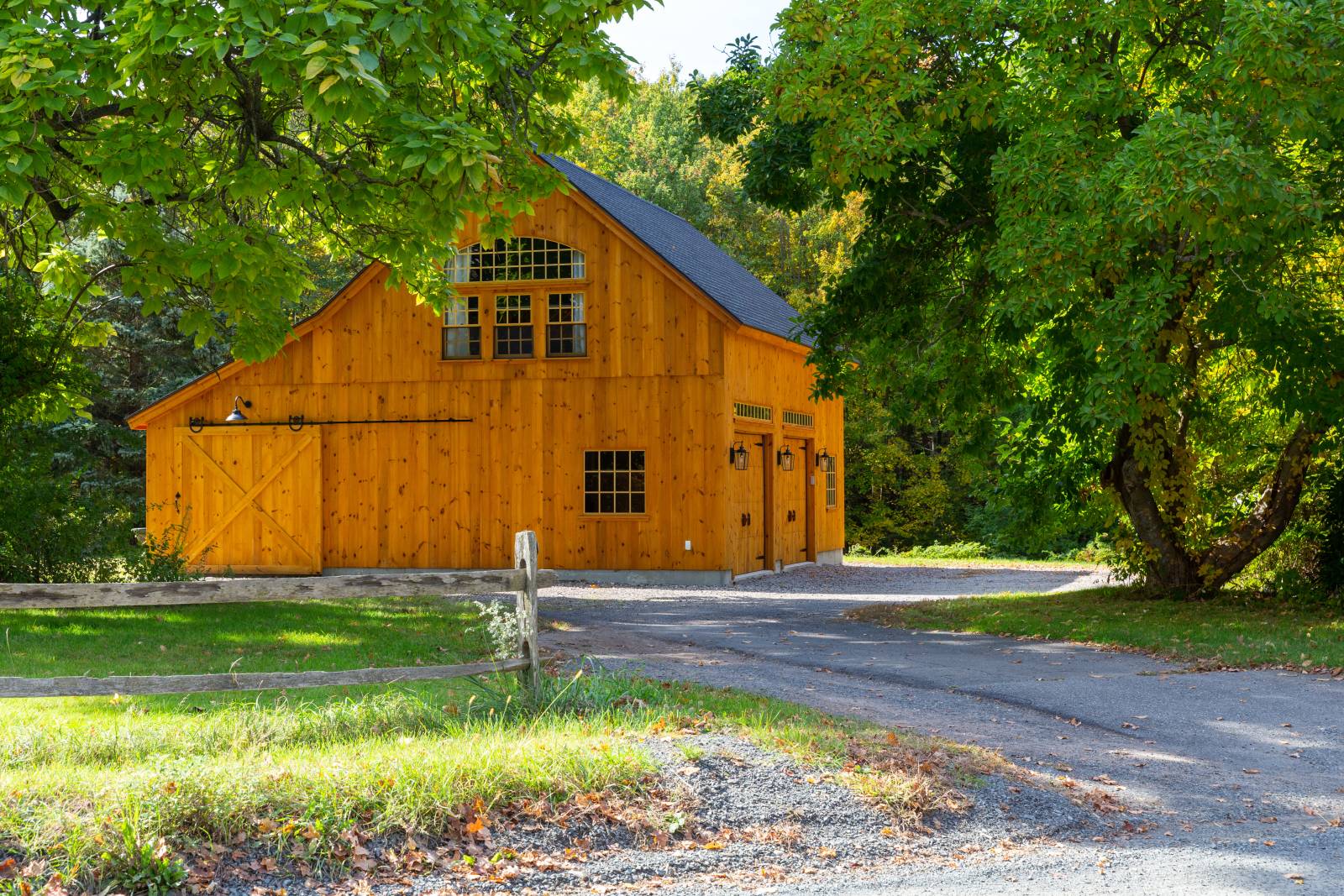Pine Siding • Overhead Doors • Sliding Doors • 10' x 32' Lean-to • Post & Beam Barn