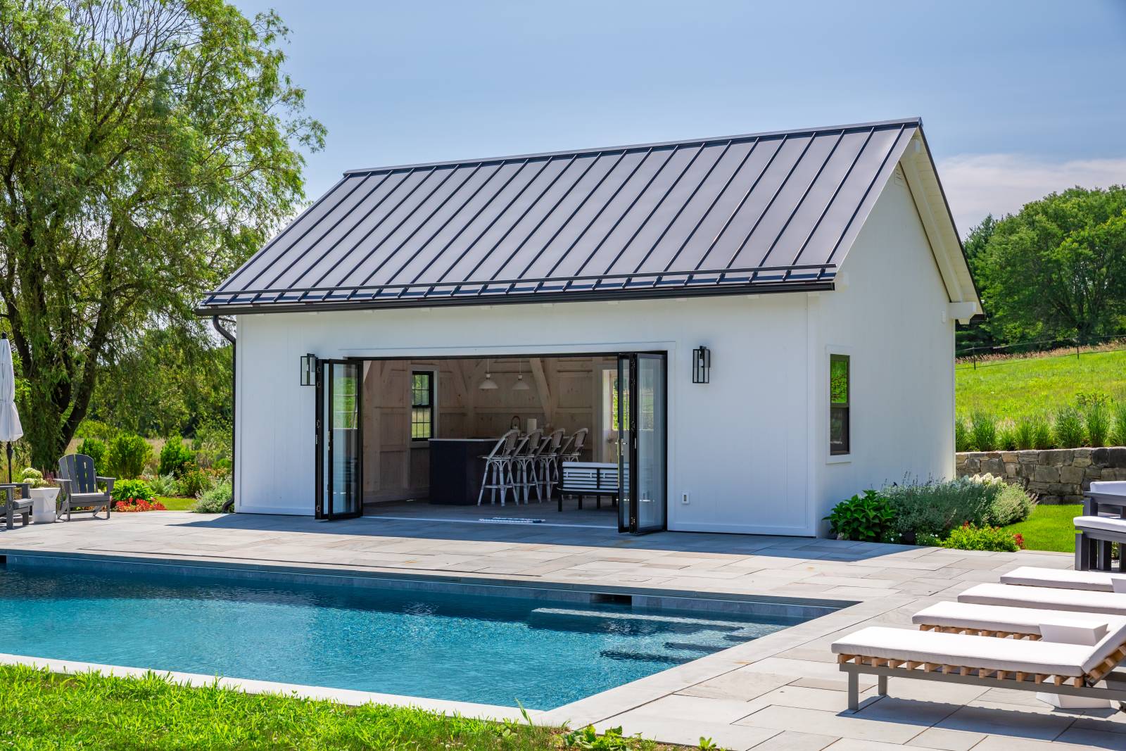 NanaWall Folding Glass Door • Corrugated Metal Roof • Timber Frame Pool House