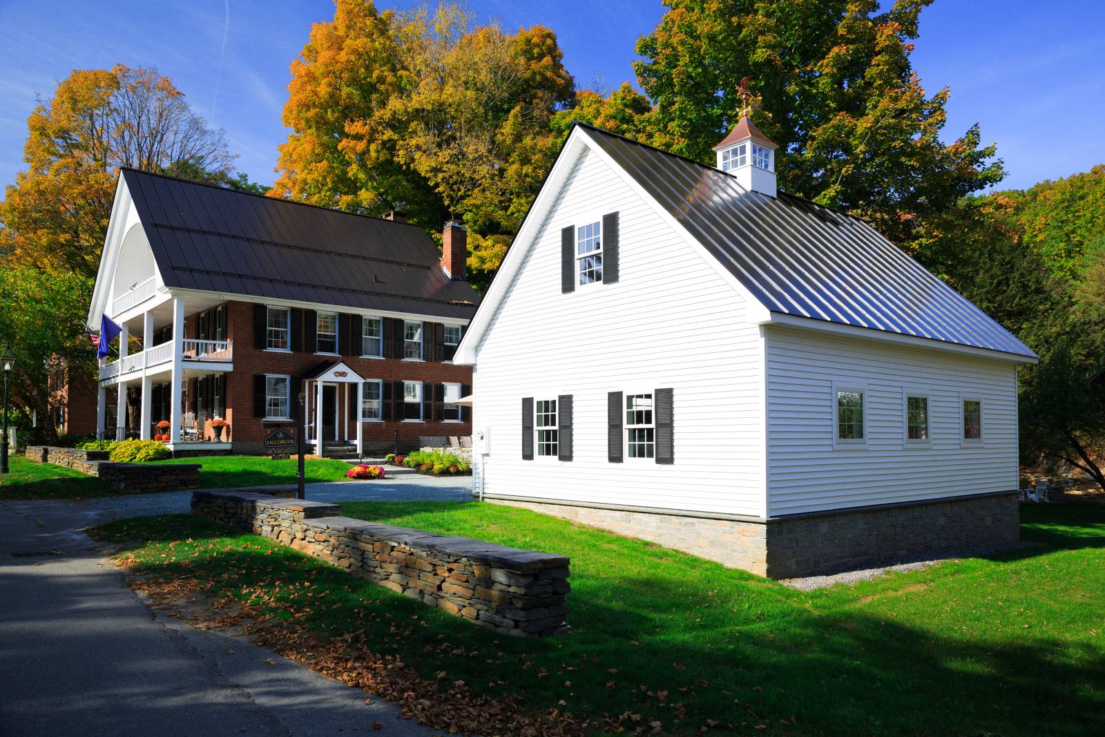 Vinyl Clapboard Siding • Black Shutters