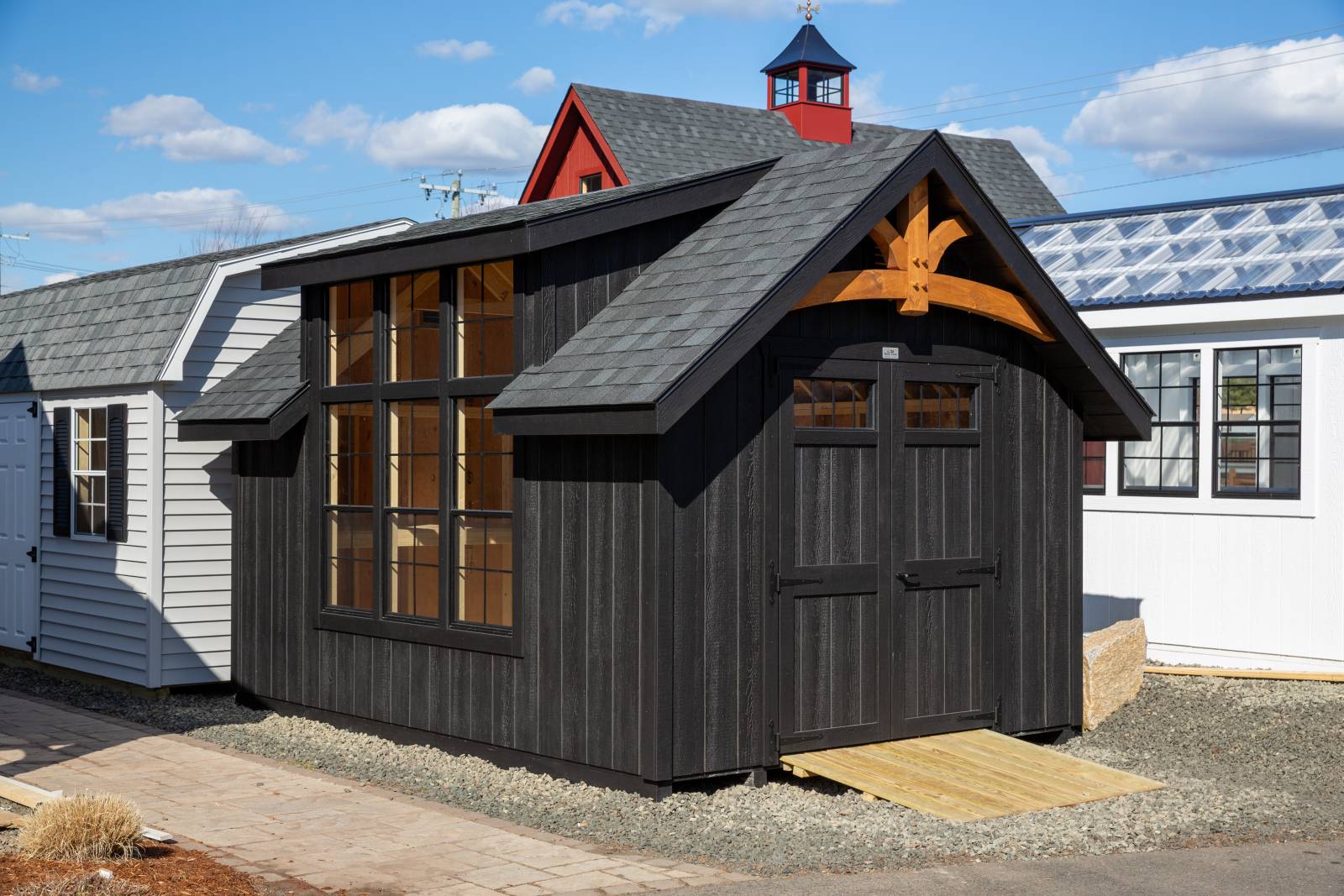 10' x 14' Victorian Cottage with Flat Black Duratemp Siding, Modern Dormer, and Arched Timber Frame Accent Truss