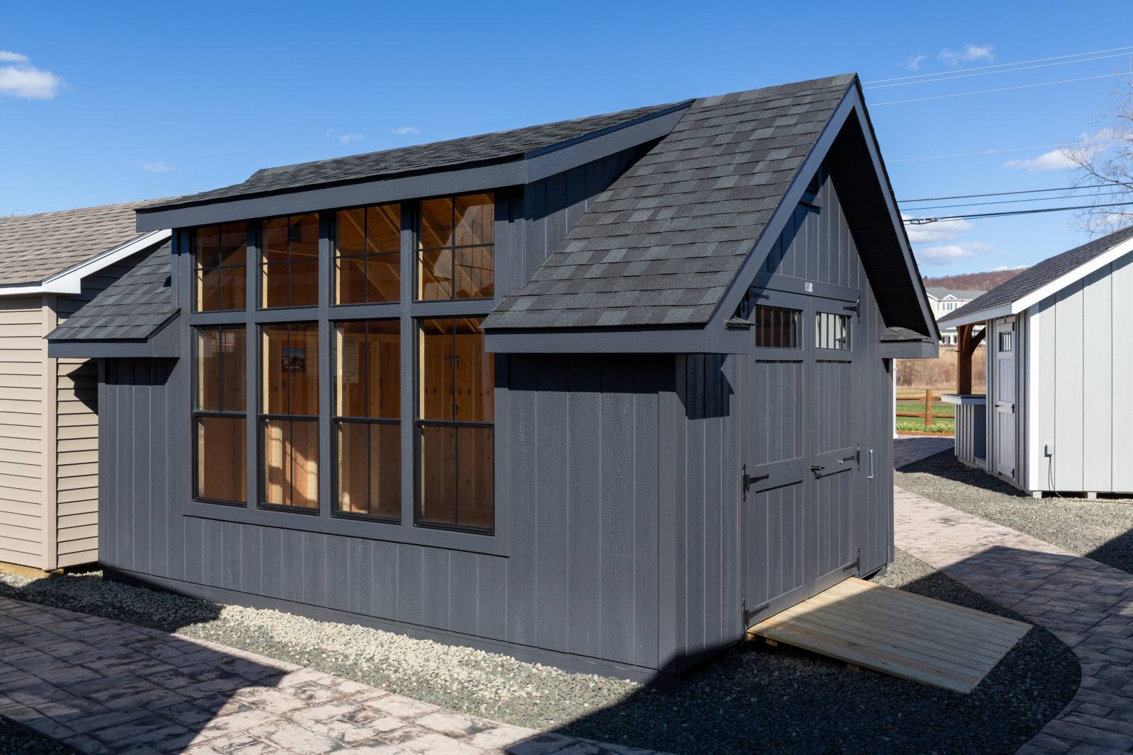12' x 16' Victorian Cottage with Mopboard Black Duratemp Siding and Modern Dormer