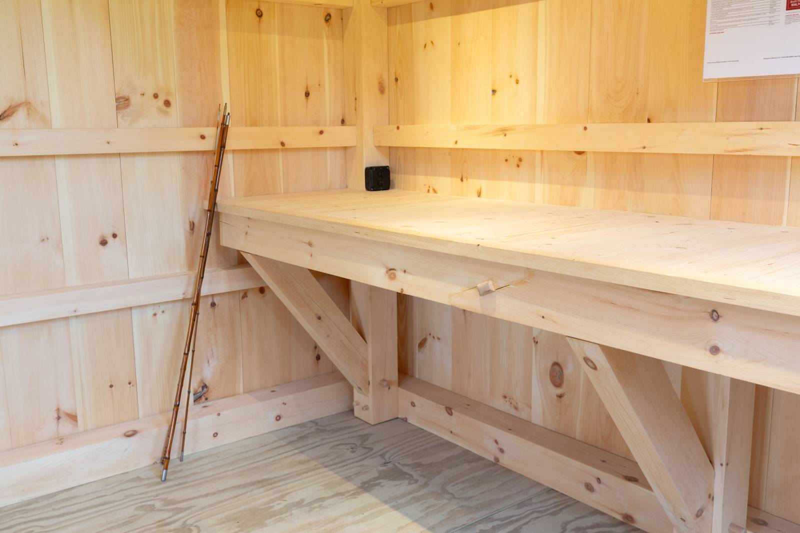 Timber frame workbench built into the cabin