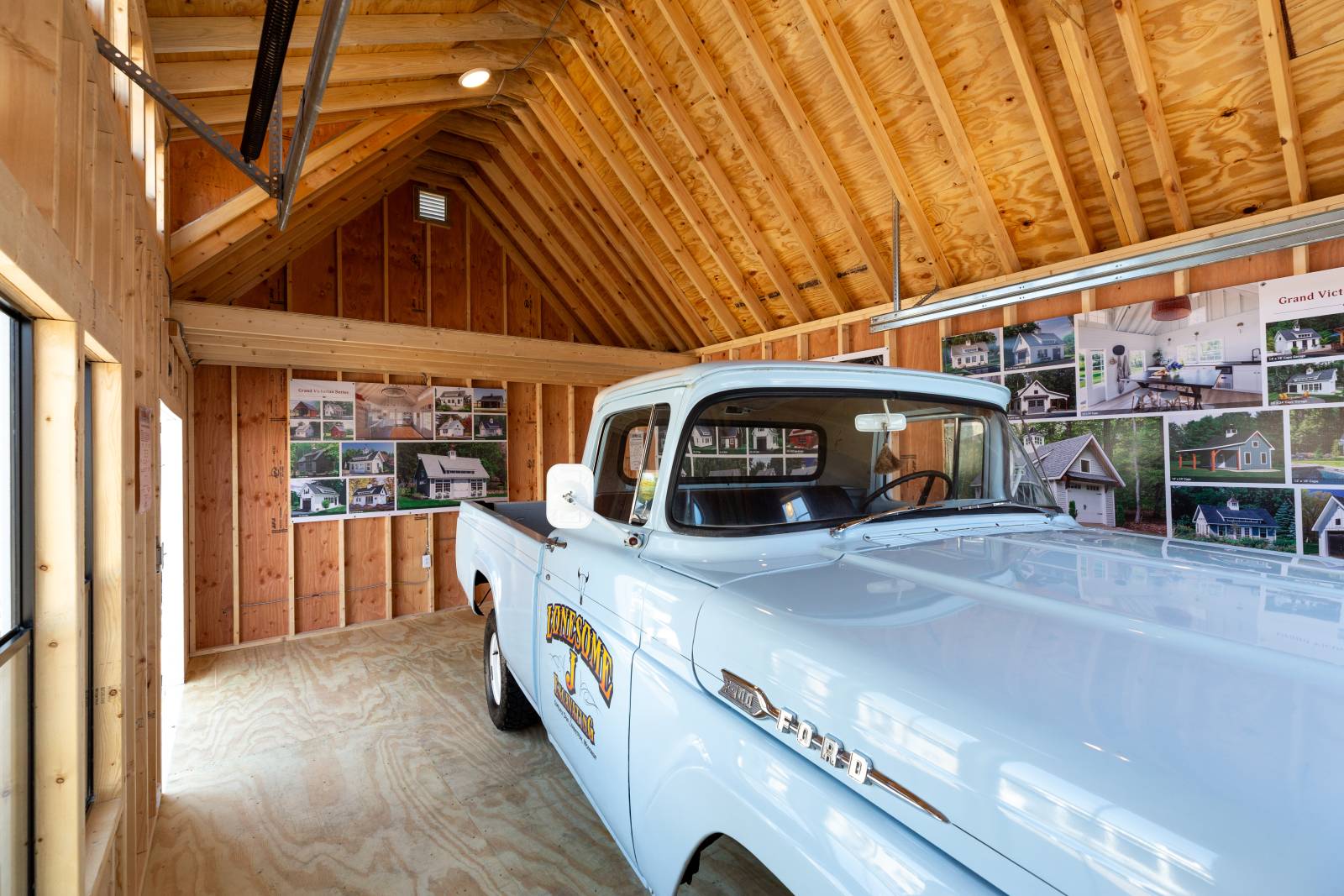 9' walls, 6' loft, and 6-window farmhouse dormer enhance the garage’s interior