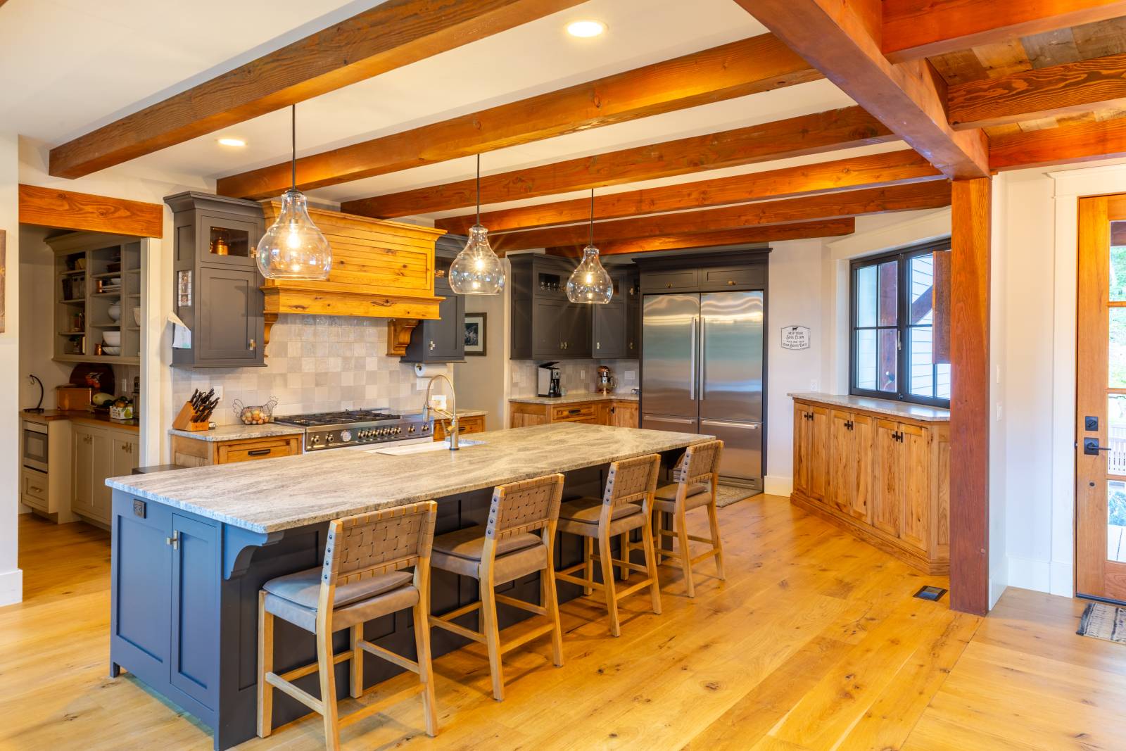 Douglas fir beams in the kitchen warm up the space