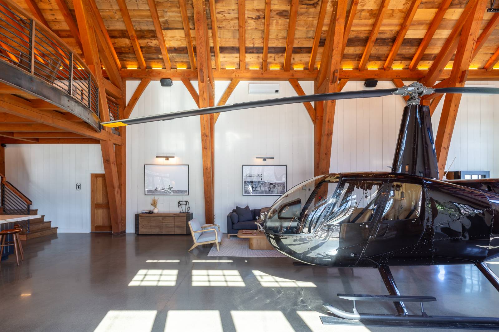 The barn is a perfect fit for the helicopter