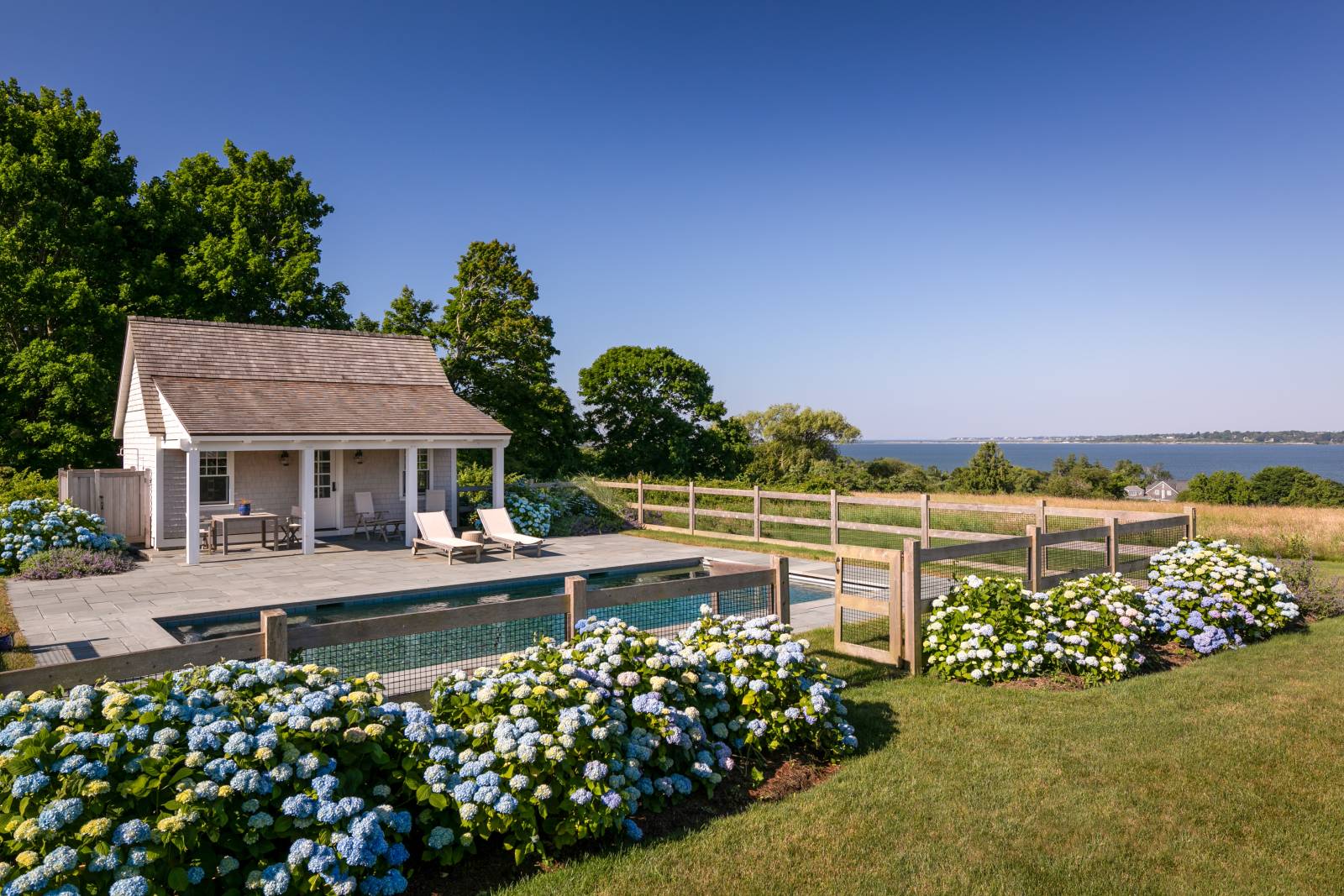 The custom pool house, and the view of the coast