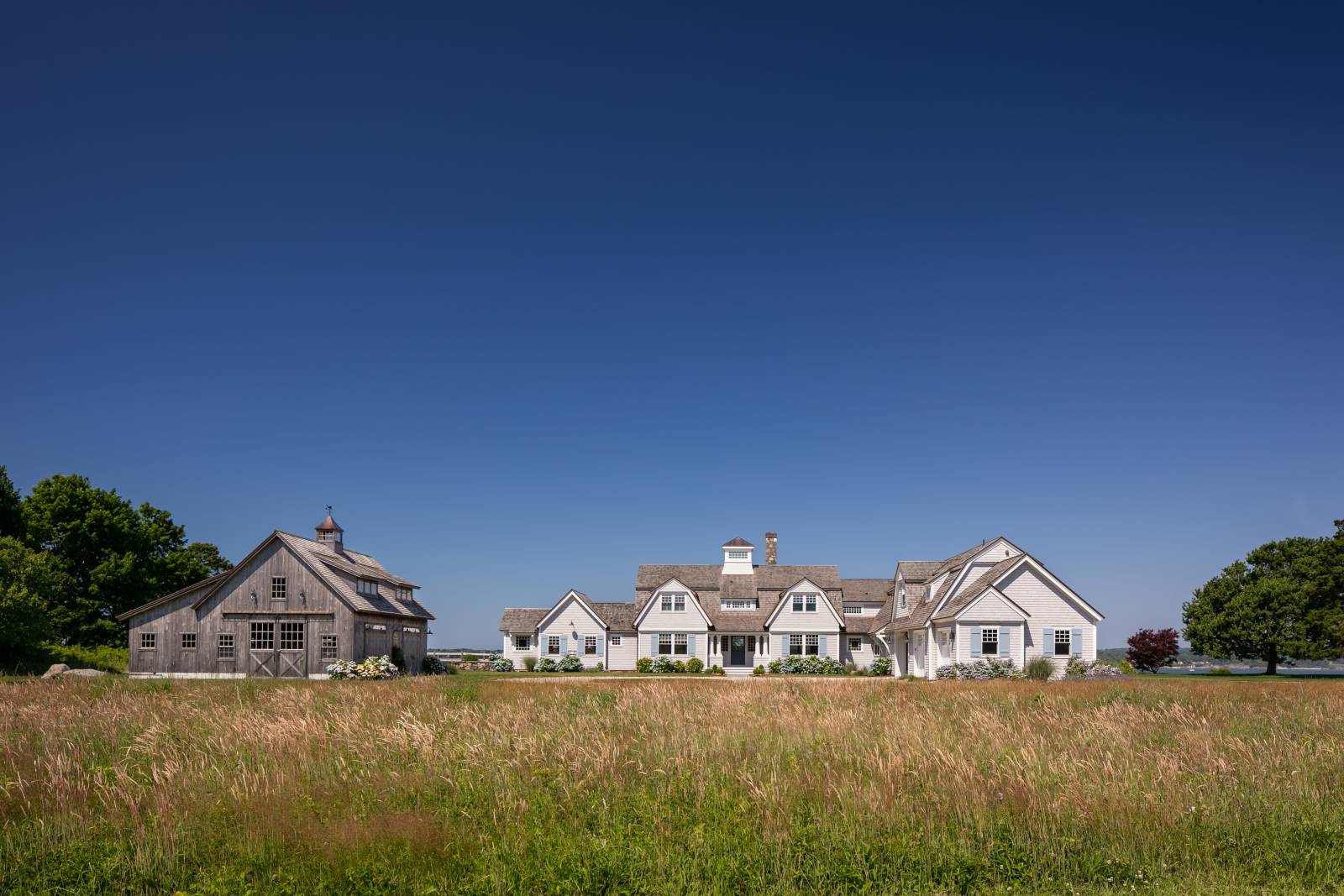 The barn fits in perfectly on the coastal estate