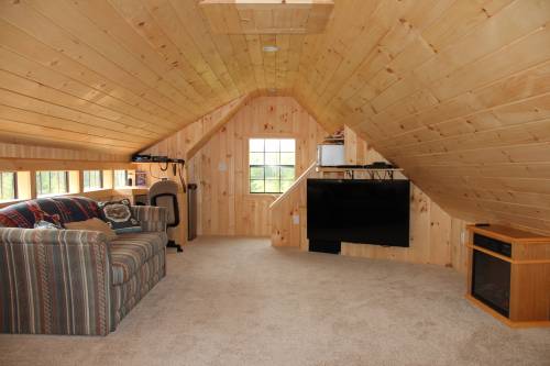 Fully carpeted upstairs with TV & couch