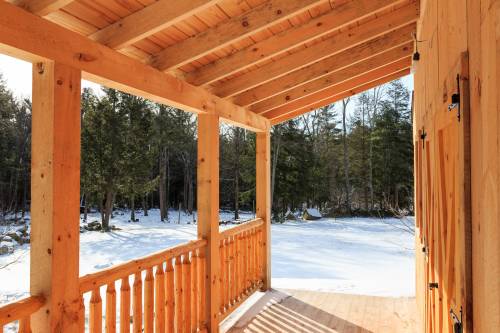 Timber framed porch offers shelter from the elements