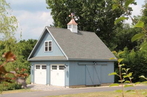 A Faux Sliding Barn Door Dresses Up This Garage