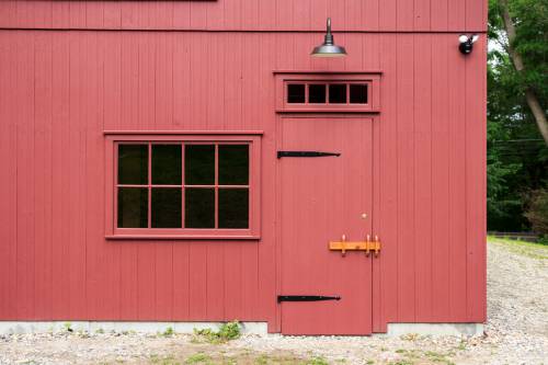 Large Window with Single Door and Transoms Above