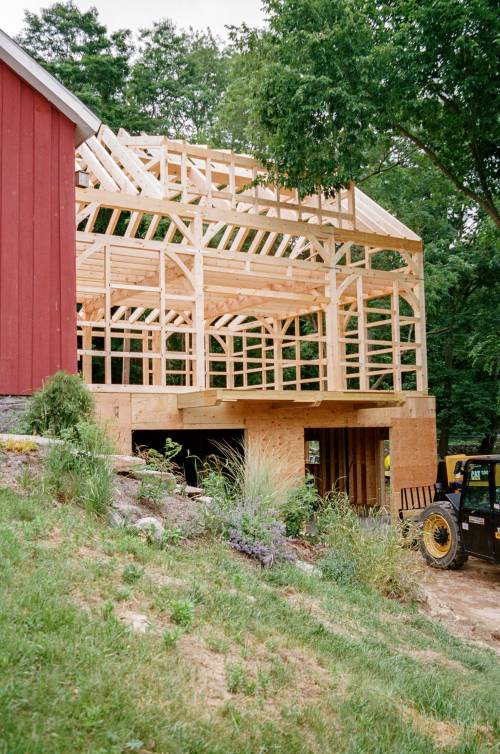 Barn is carved into a hillside