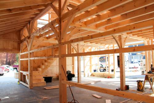 Inside showing heavy timber stairway