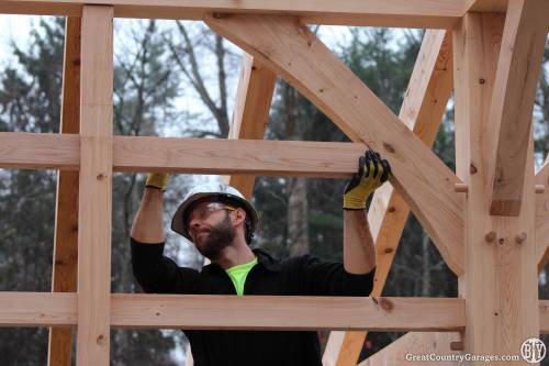 Joel secures wall purlins