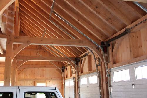 Custom garage door tracks follow roofline