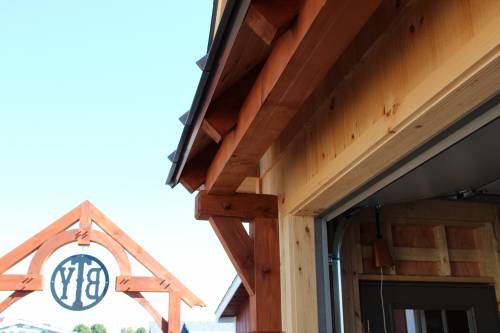 Timber frame eyebrow roof