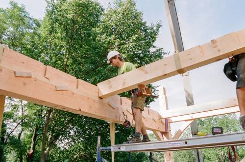 Matt secures the dovetail floor joists